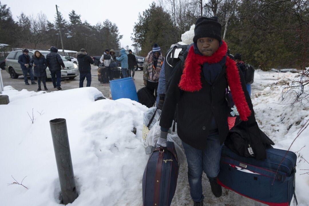 Ottawa Paying to Move Roxham Road Migrants from Quebec to Other Provinces