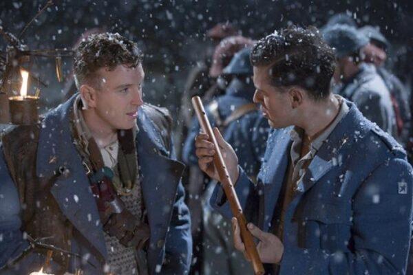 Papageno (L) and Tamino look at the magic flute, in Kenneth Branagh's film, "The Magic Flute." (Revolver Entertainment)