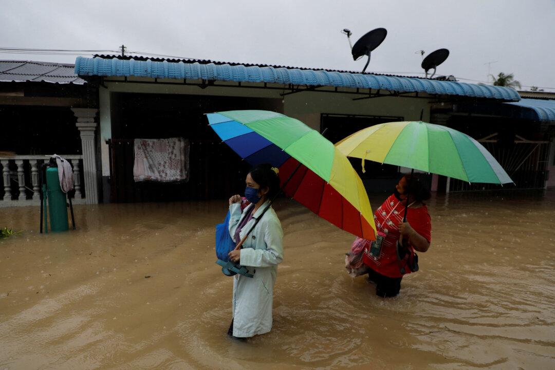 Flooding in Southern Malaysia Forces 40,000 People to Flee Homes