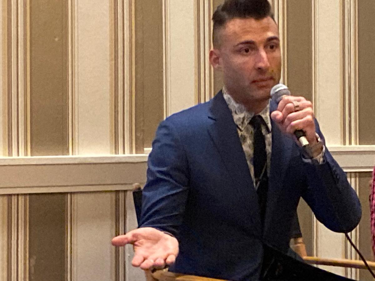 John Strand, arrested for going inside the U.S. Capitol on Jan. 6, 2021, talks to an audience at CPAC on March 3, 2023. (Janice Hisle/The Epoch Times)