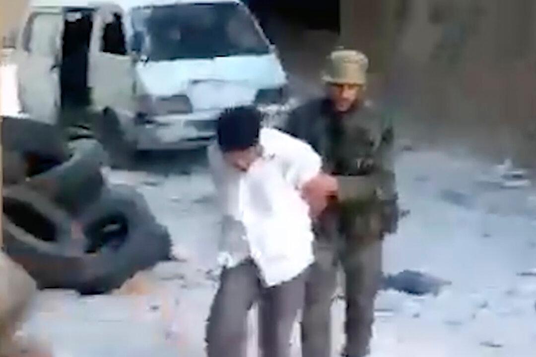 US Bans Entry to Syria Security Agent Over Killings on Video