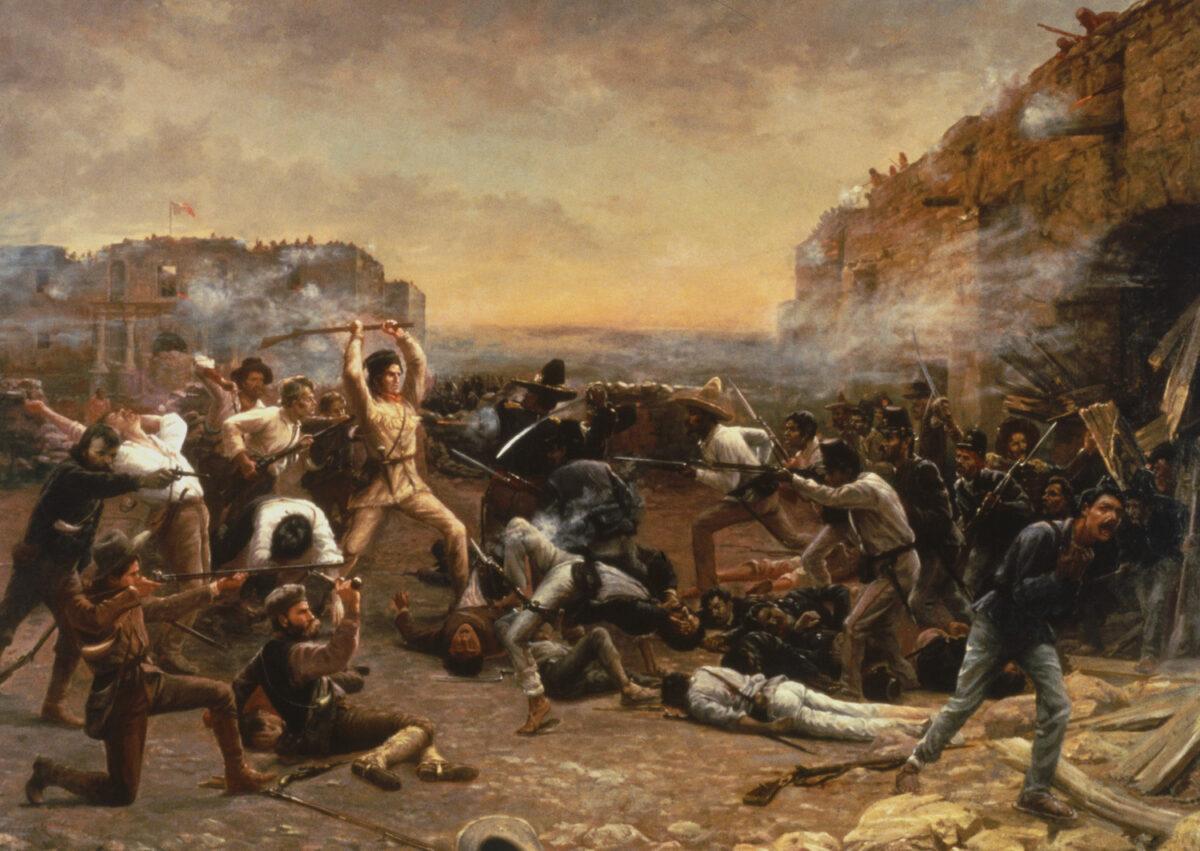 This painting by Robert Jenkins Onderdonk, called "Fall of the Alamo," shows Texan defenders of the Alamo fighting Mexican soldiers within the walls of the fortress, and Davy Crockett (1786-1836) (C) brandishing his rifle above his head before dying in the siege. (MPI/Getty Images)