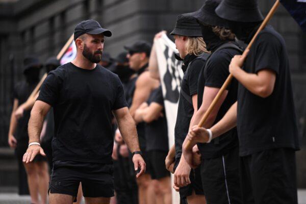 The group of Nazi supporters disrupting the Let Women Speak rally is seen in Melbourne, Australia, on March 18, 2023. (AAP Image/James Ross)
