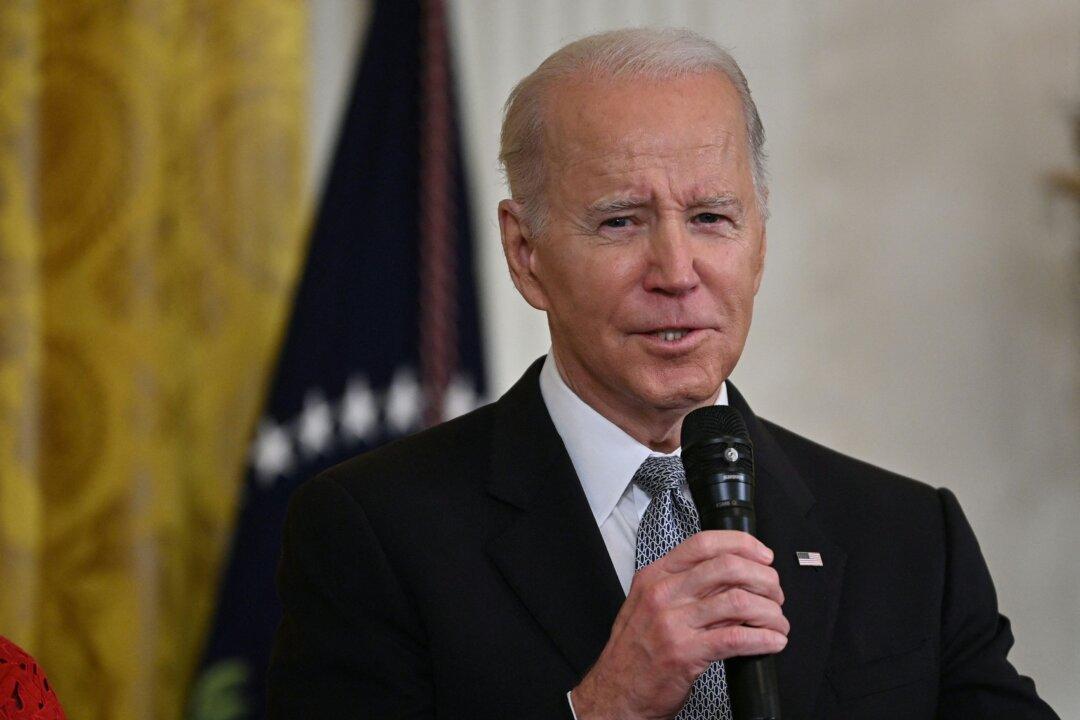 Biden Signs Bill to Declassify COVID Origins Intelligence on Wuhan Lab