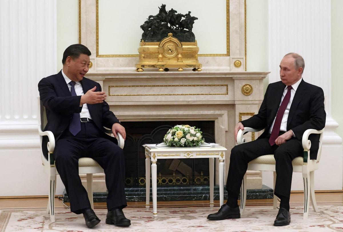 As China’s Xi Arrives in Moscow, Experts Say Peace Efforts a Smoke Screen