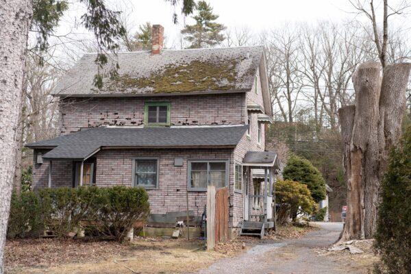 One of the single-family houses at the site of the future veteran village on Main Street in Port Jervis, N.Y., on March 17, 2023. (Cara Ding/The Epoch Times)