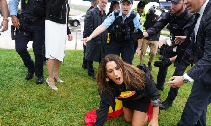 Senator Pulled to the Ground by Police After Interfering in Women’s Rights Rally