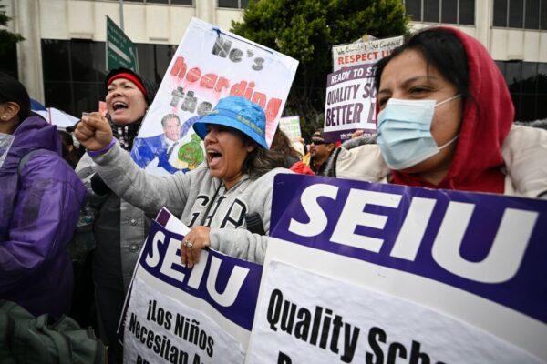 Los Angeles public school support staff, teachers, and supporters rally outside of the school district headquarters on the first day of a three day strike in Los Angeles on March 21, 2023. (Robyn Beck/AFP via Getty Images)