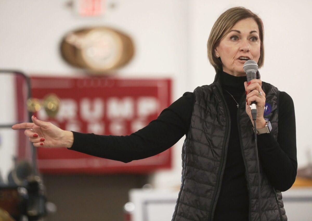 Iowa Gov. Kim Reynolds speaks at a campaign event for Sen. Joni Ernst (R-Iowa) at Dahl Auto Museum as part of Ernst's RV tour of Iowa, in Davenport on Oct. 31, 2020. (Mario Tama/Getty Images)