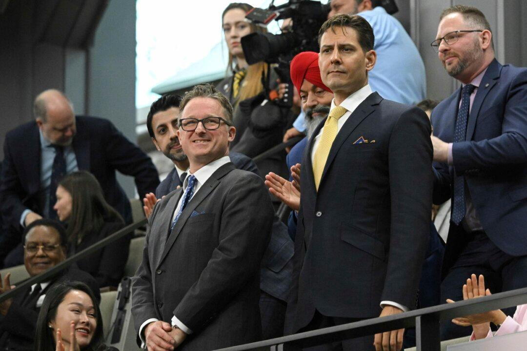 Kovrig and Spavor Receive Standing Ovation Ahead of Biden’s Speech to Parliament