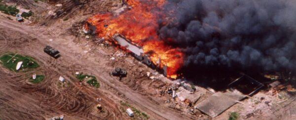 The Branch Davidian compound in flames in "Waco: American Apocalypse." (Netflix)