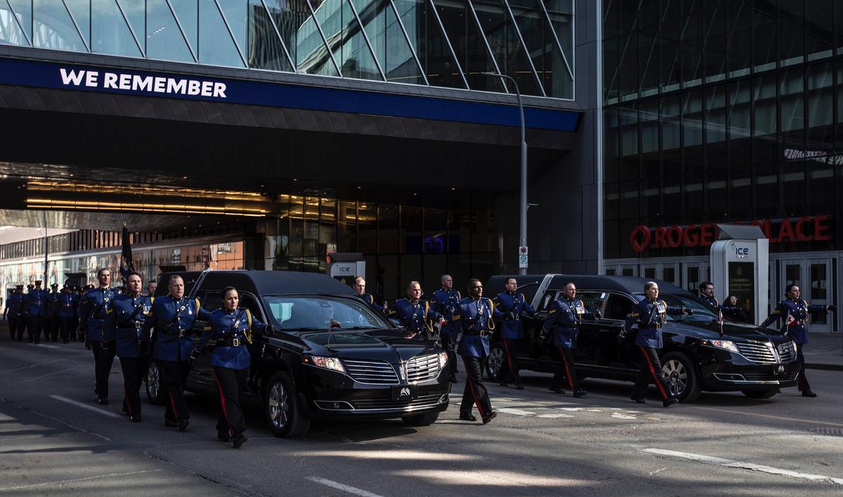 Thousands of Officers March in Funeral Procession for Two Edmonton Police Constables Killed on Duty