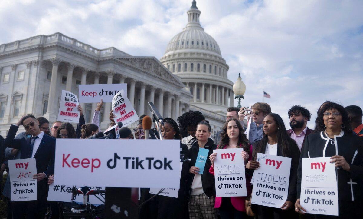 People gather for a press conference about their opposition to a TikTok ban on Capitol Hill in Washington on March 22, 2023. (Brendan Smialowski/AFP via Getty Images)