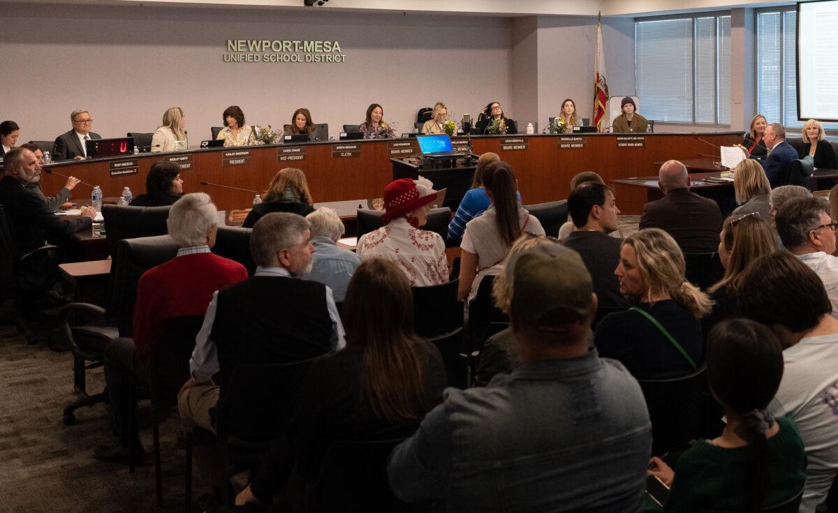 Students and parents attend a Newport Mesa Unified School District meeting in Costa Mesa, Calif., on March 28, 2023. (John Fredricks/The Epoch Times)