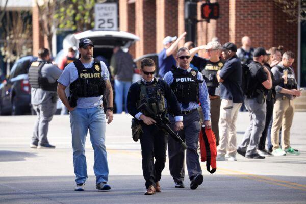 Law enforcement officers respond to an active shooter at the Old National Bank building in Louisville, Ky., on April 10, 2023. (Luke Sharrett/Getty Images)