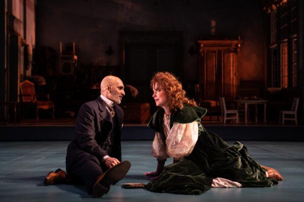 (L—R) Lopakhin (Kareem Bandealy) and Lyubov Ranevskaya (Kate Fry), in Anton Chekhov’s “The Cherry Orchard.” (Goodman Press)