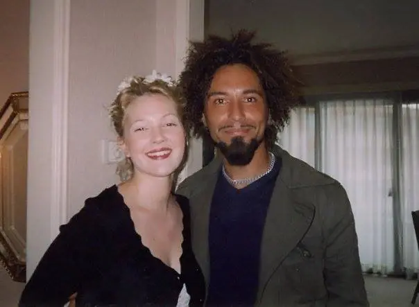 Gabriel Georgiou with Drew Barrymore for the premiere of The Wedding Singer, a 1998 American film directed by Frank Coraci. (Courtesy of Gabriel Georgiou)