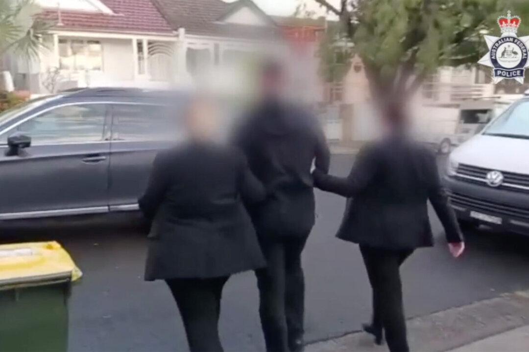 Businessman Facing Spy Charge to Live With Elderly Mum