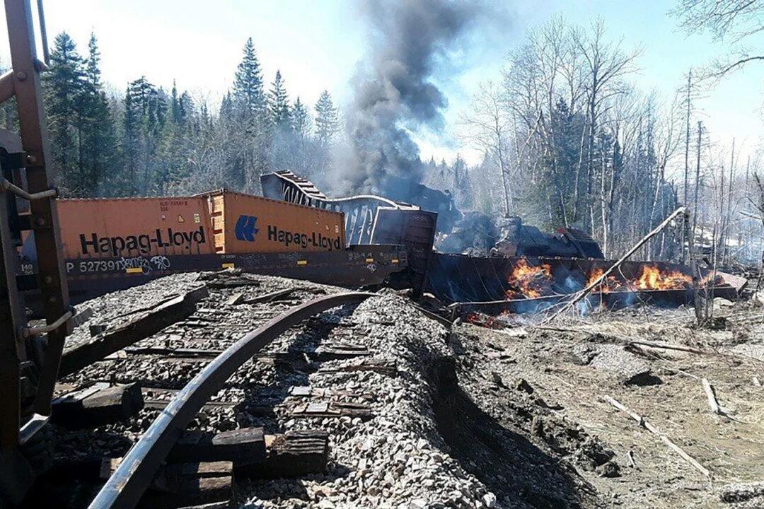 Freight Train Engines, Cars Derail and Catch Fire in Maine
