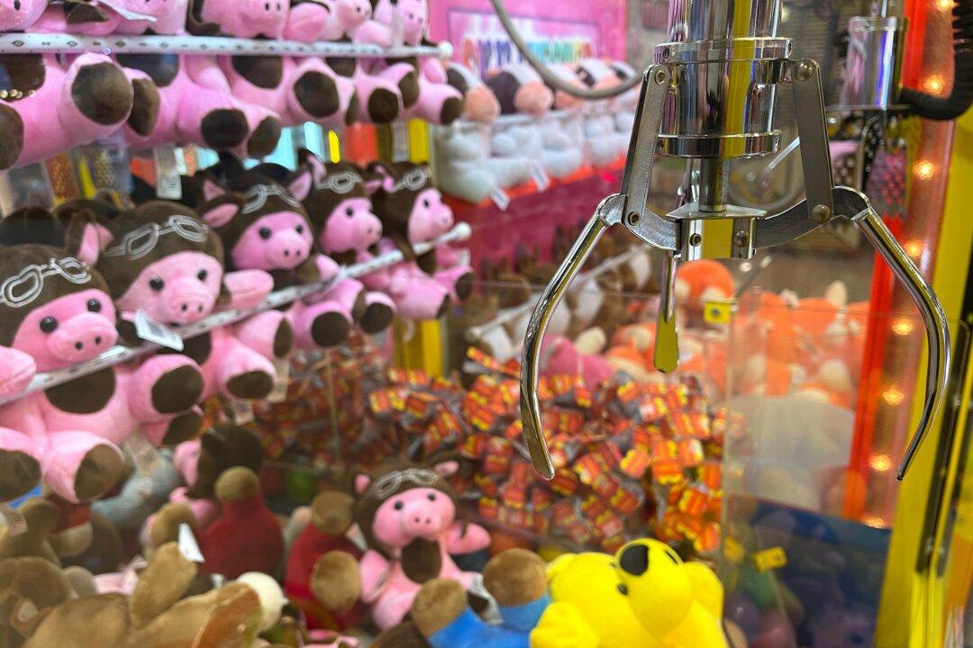 Boy, 13, Gets Stuck Climbing Into Claw Machine for Prize