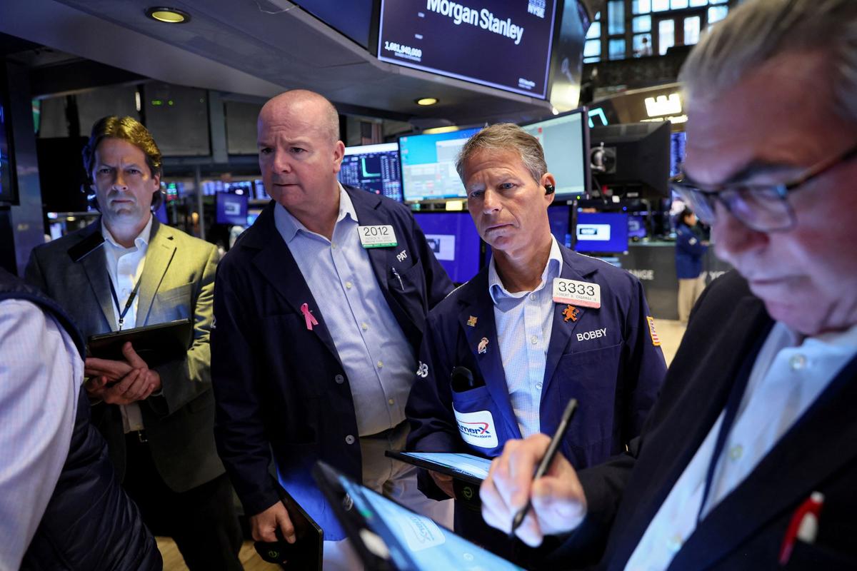 Wall Street Opens Higher as Upbeat Earnings Lift Mood