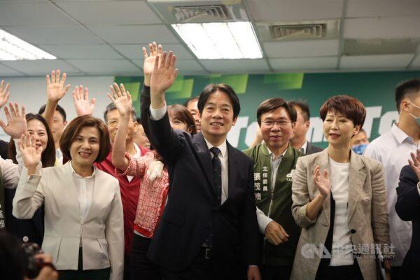 Vice President Lai Ching-te (front, center) waves to reporters at the DPP headquarters in Taipei Wednesday after he received the DPP's nomination to run in the presidential elections scheduled on Jan. 13, 2024. CNA photo April 12, 2023