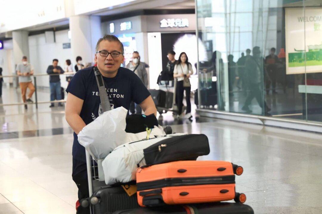 On Bail Chairman of the Hong Kong Journalist Association Returns From Oxford for Trial