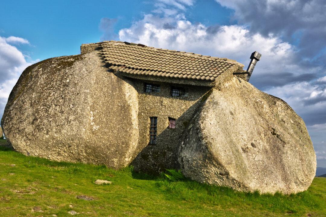 The Real-Life Flintstones Home: Bizarre ‘Stone House’ Built From Boulders Has Bulletproof Windows—but No Electricity