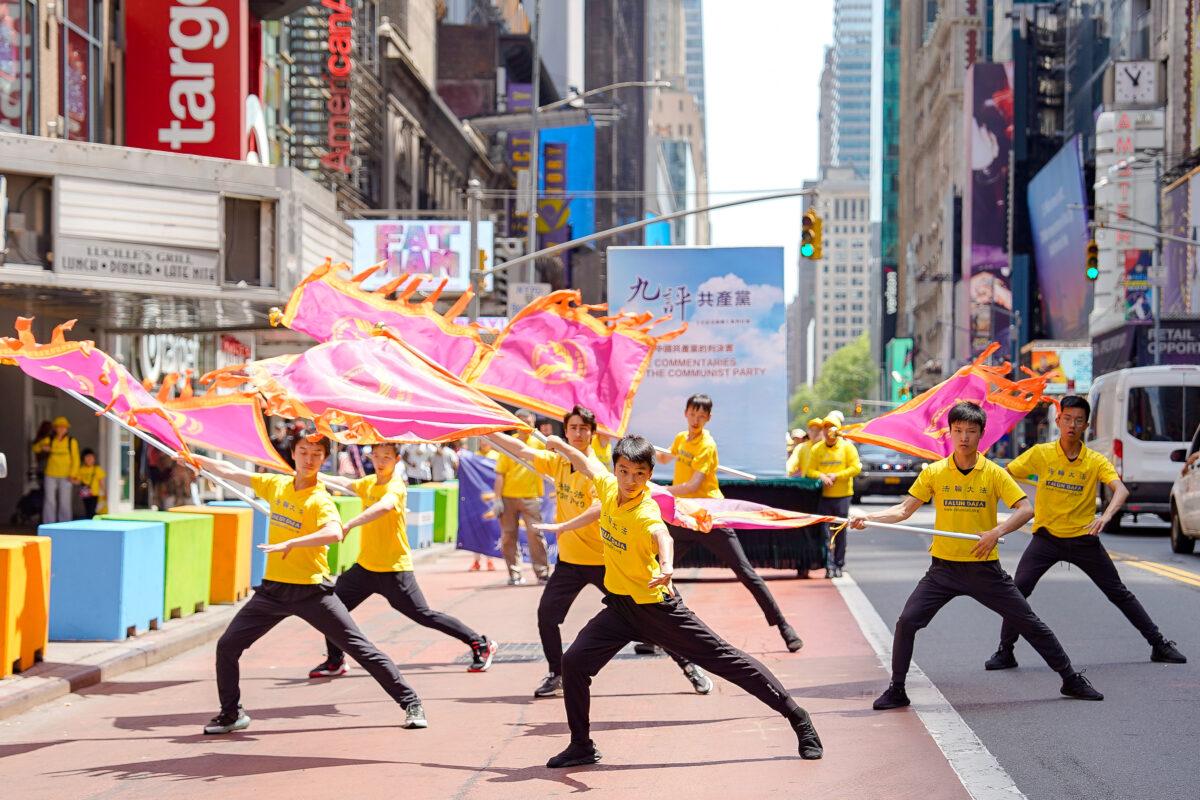 Falun Gong practitioners march in Manhattan to celebrate World Falun Dafa Day on May 12, 2023. (Samira Bouaou/The Epoch Times)