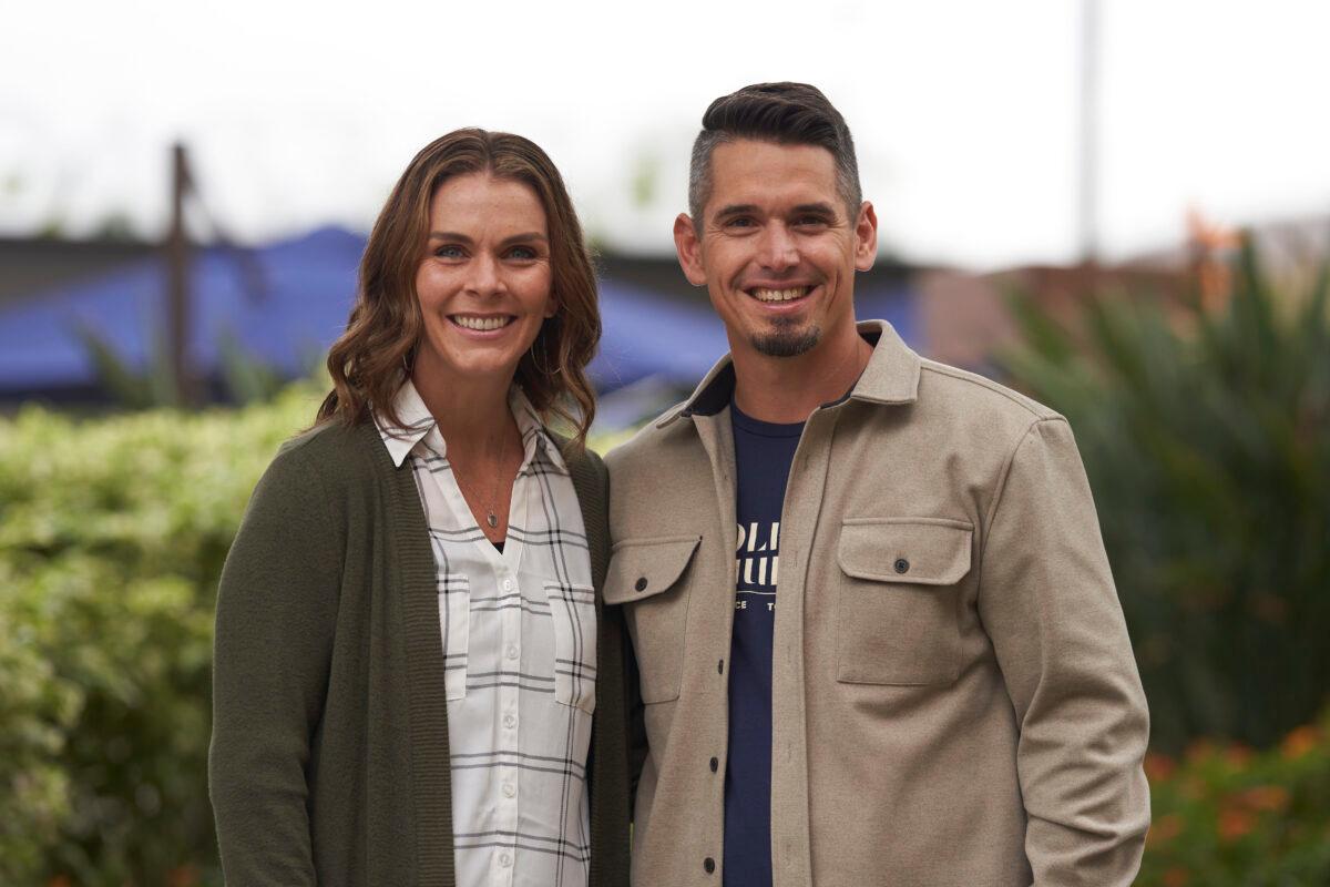 Stacie Wood and her husband, Andy Wood, stand for a portrait at Saddleback Church in Lake Forest, Calif., on Oct. 16, 2022. (AP Photo/Allison Dinner)