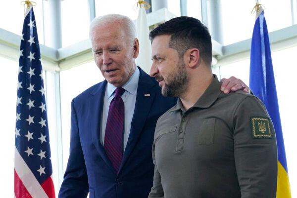 President Joe Biden (L) walks with Ukrainian President Volodymyr Zelenskyy ahead of a working session on Ukraine during the G-7 Leaders' Summit in Hiroshima, Japan, on May 21, 2023. (Susan Walsh/Pool/AFP via Getty Images)