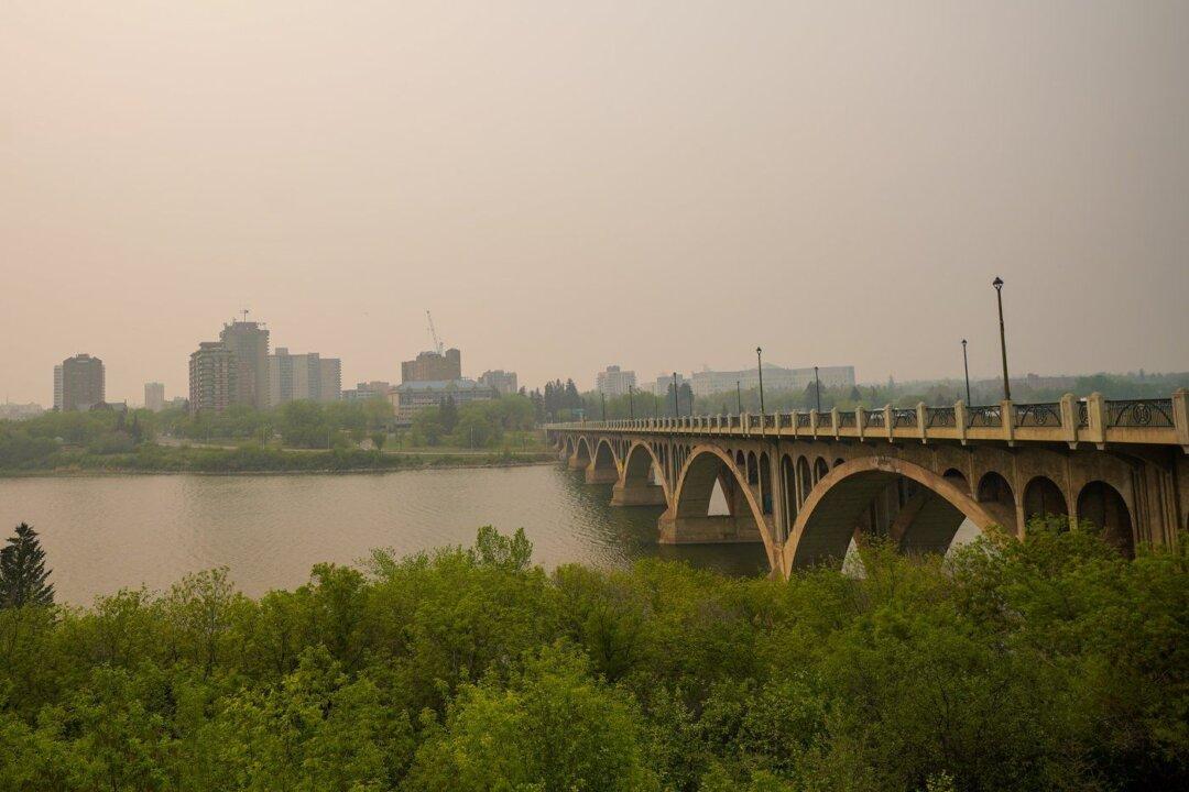 Rain Forecast Could Slow Down Record-Breaking Alberta Wildfires, Officials Say
