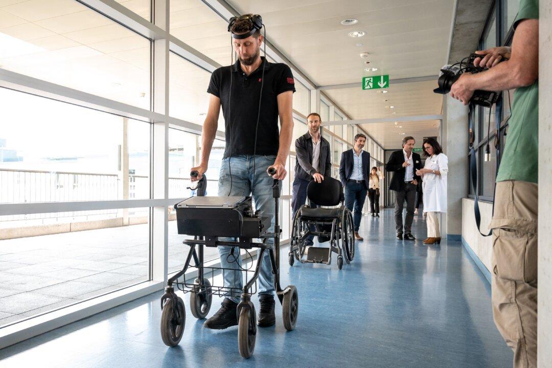 Man Paralyzed for 12 Years Walks Again Thanks to Brain, Spinal Cord Implants