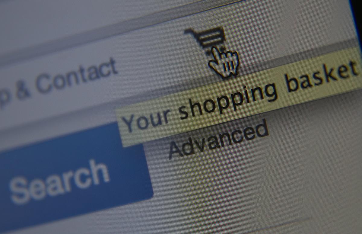A laptop displays the shopping basket on the eBay website in Bristol, United Kingdom, on Aug. 11, 2014. (Matt Cardy/Getty Images)