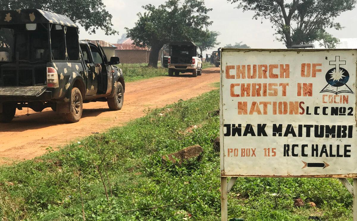 Signpost to Jwak Maitumbi village where The Epoch Times team was attacked on May 16, 2023. (Masara Kim/The Epoch Times)