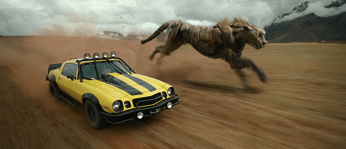 The voiceless Bumblebee in Camaro form,<span class="ILfuVd" lang="en"><span class="hgKElc"> with Cheetor (voiced by Tongayi Chirisa), a Maximal scout who transforms into a cheetah,</span></span> in “Transformers: Rise of the Beasts.” (Paramount Pictures)