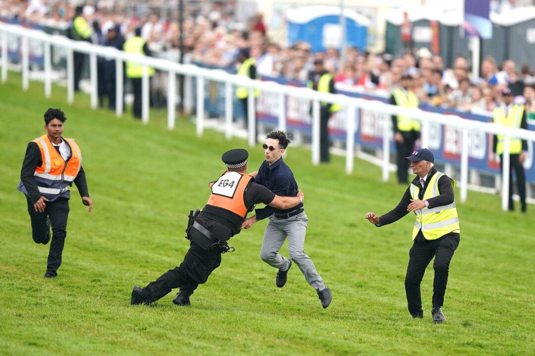 Animal Rights Protester Charged After Running Onto Epsom Racecourse