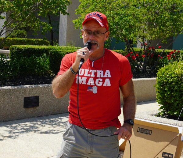 Protest organizer Brian Pannebecker addresses demonstrators at the federal building in Detroit on June 3, 2023. (Steven Kovac/The Epoch Times)