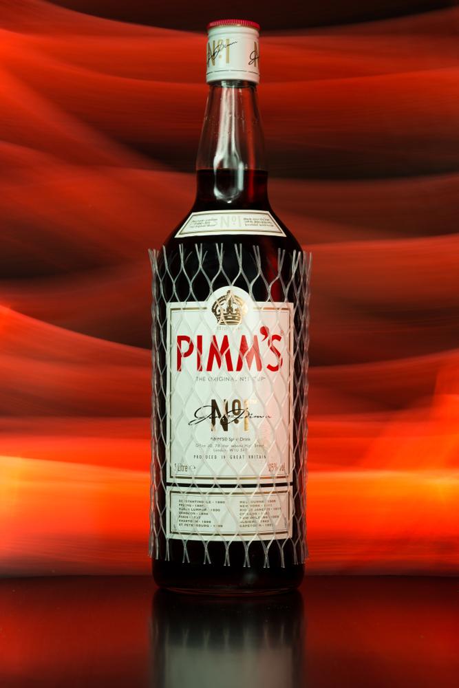 Pimm's No. 1 Cup, a secret blend of gin, quinine, and spices, is the defining liqueur. (DavidSamperio/Shutterstock)