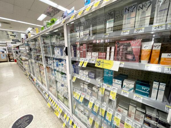 Products are displayed in locked security cabinets at a Walgreens store that's set to be closed in the coming weeks in San Francisco on Oct. 13, 2021. (Justin Sullivan/Getty Images)
