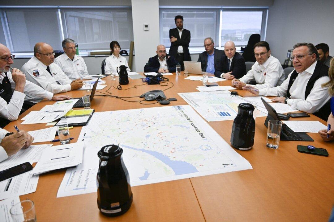 International Reinforcements Arrive in Quebec as 140 Wildfires Still Burning