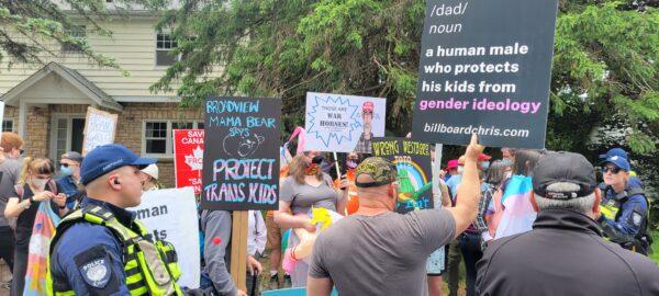 Hundreds of protestors and counter-protestors gather in Ottawa's west end clash over gender ideology being taught in schools. (Matthew Horwood/The Epoch Times)