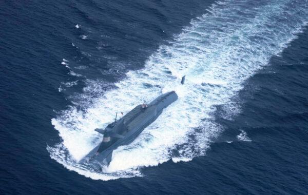 A nuclear-powered submarine of the People's Liberation Army Navy North Sea Fleet preparing to dive into the sea on Oct. 29, 2013. (AFP/AFP via Getty Images)