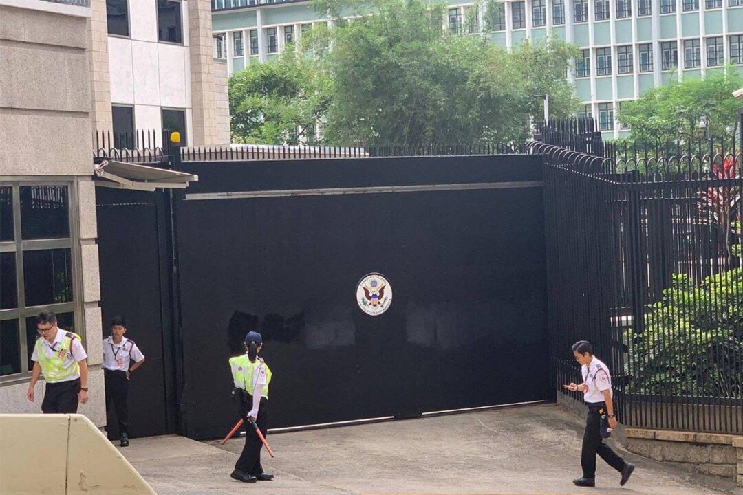 A Man from Mainland China Spray Paints Graffiti on US Consulate General in Hong Kong