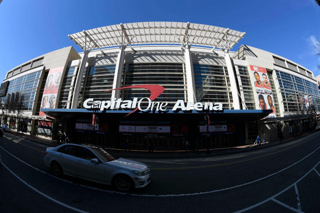 Qatar Sovereign Wealth Fund Buys Stake in Washington’s NBA, NHL and WNBA Teams, AP Source Says