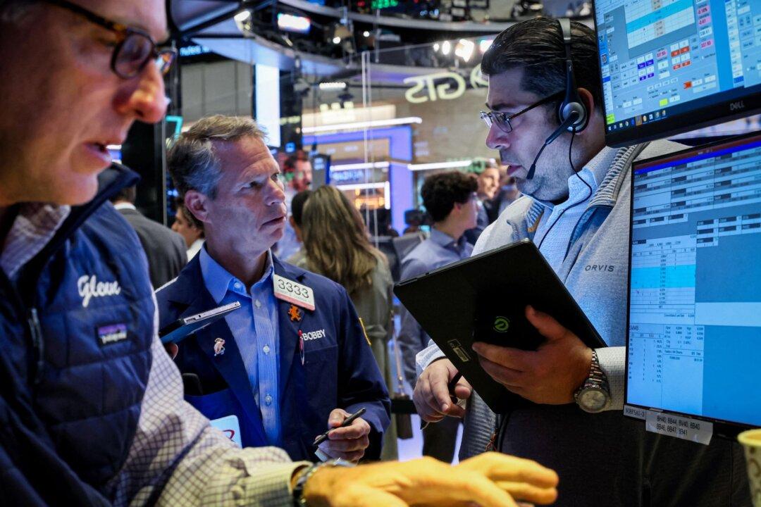 Wall Street Opens Lower as Hawkish Fed Saps Market Mood