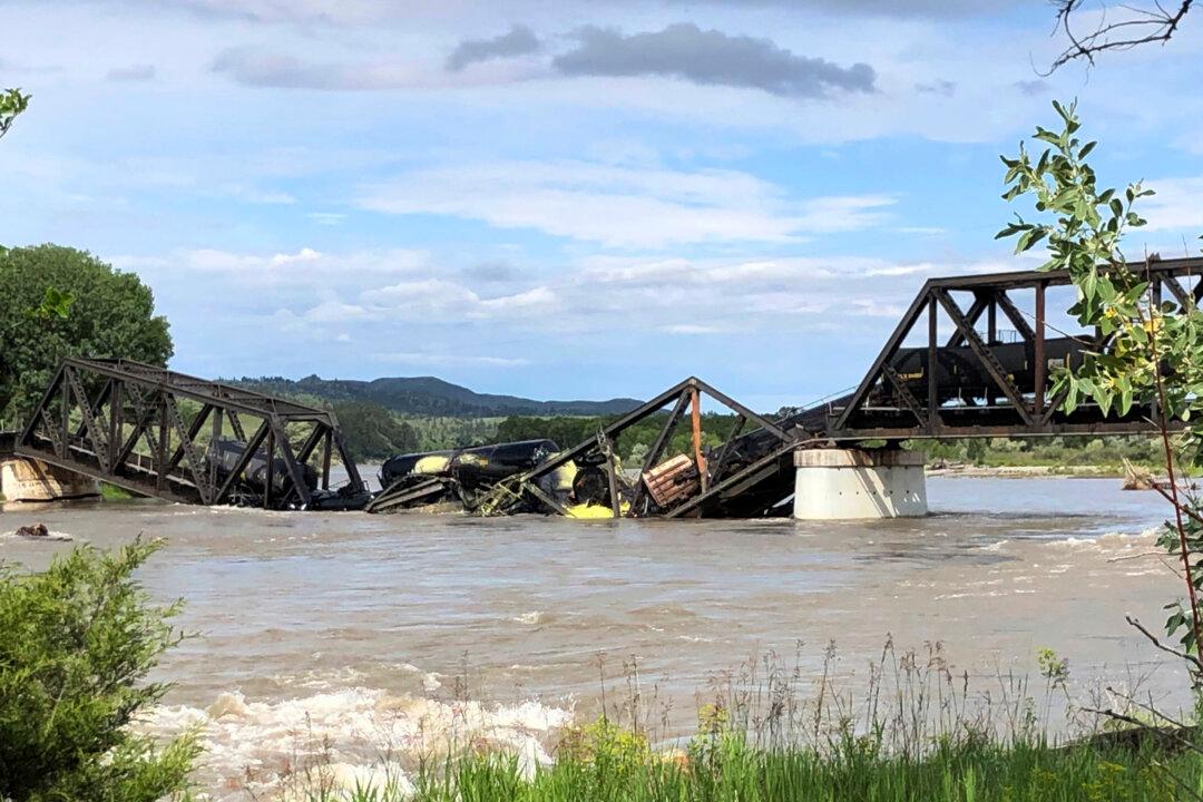 A Bridge Over Yellowstone River Collapses, Sending a Freight Train Into the Waters Below