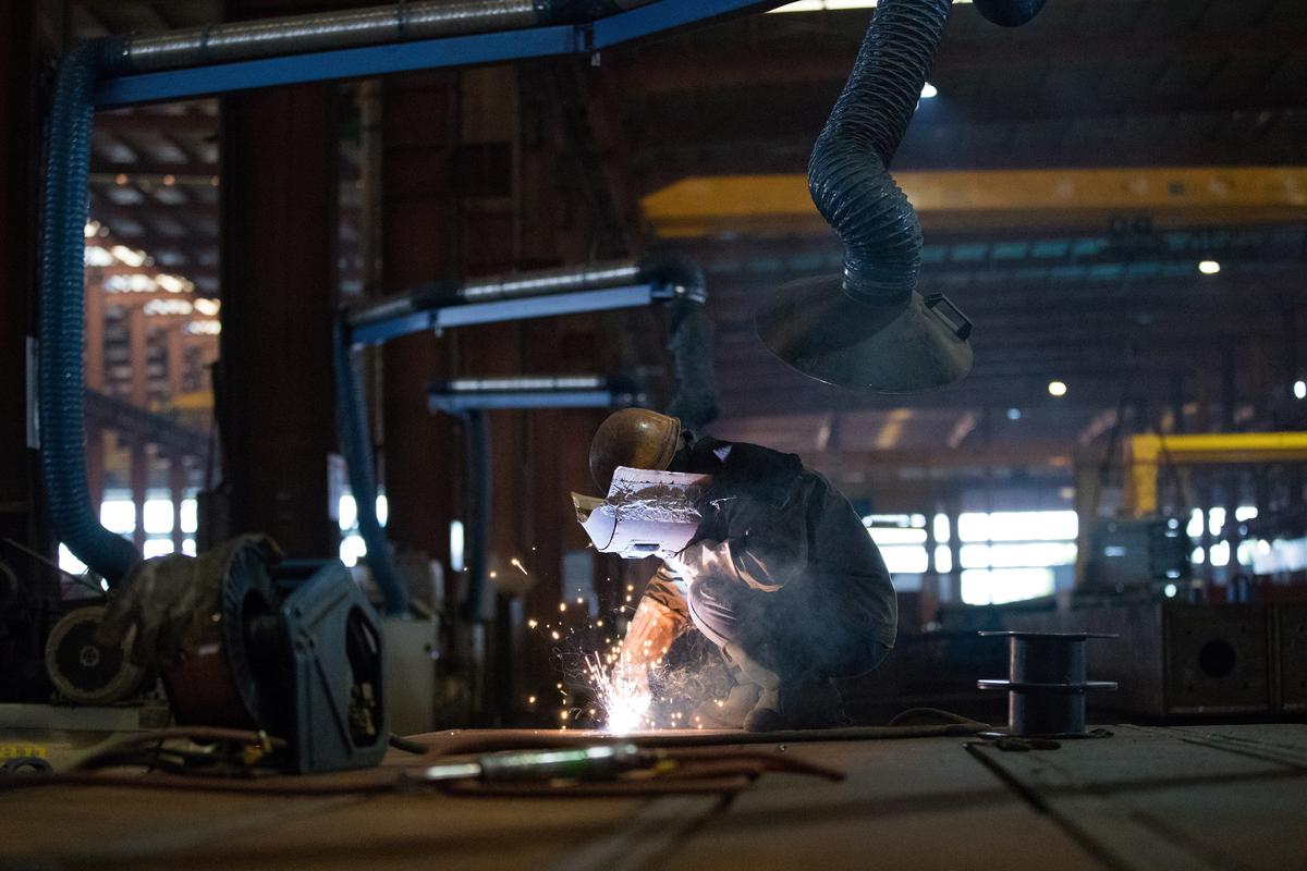 China’s Factory, Service Sectors Stumble as Economic Malaise Broadens