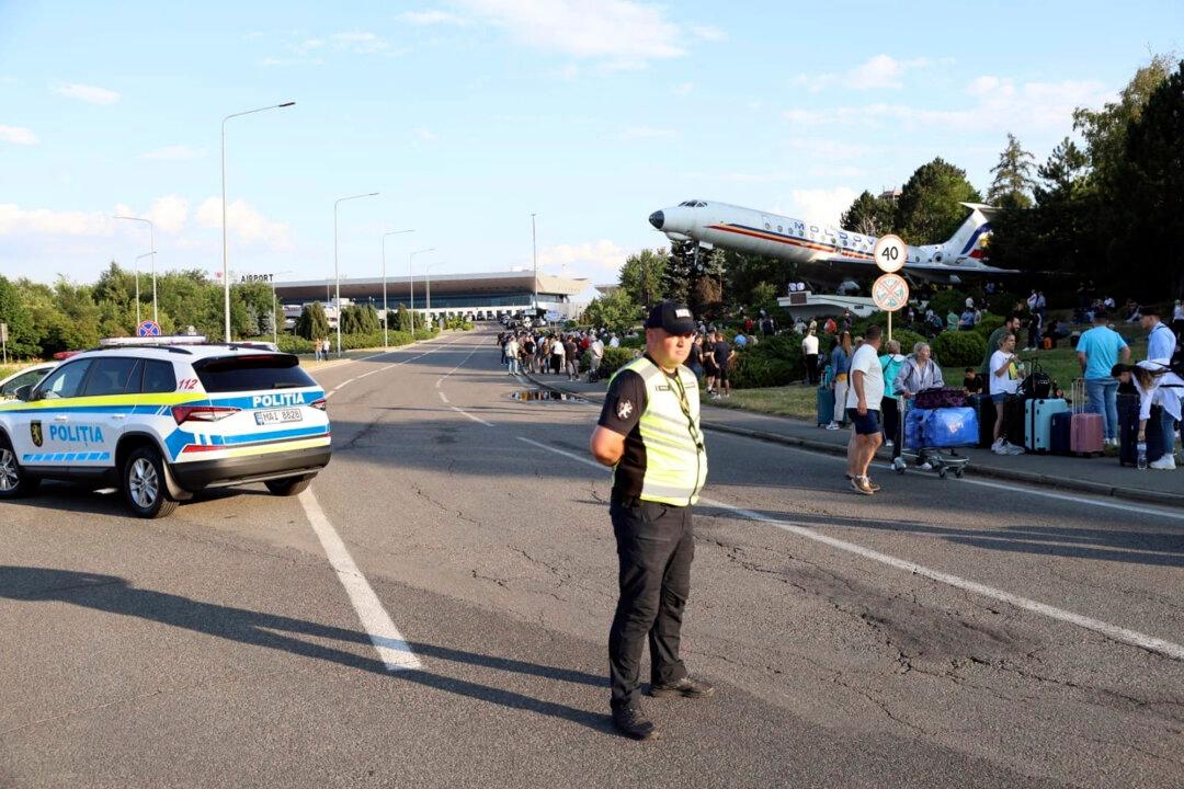 Tajik Man Fatally Shoots 2 Officers at Moldova’s Airport After He Was Denied Entry, Officials Say