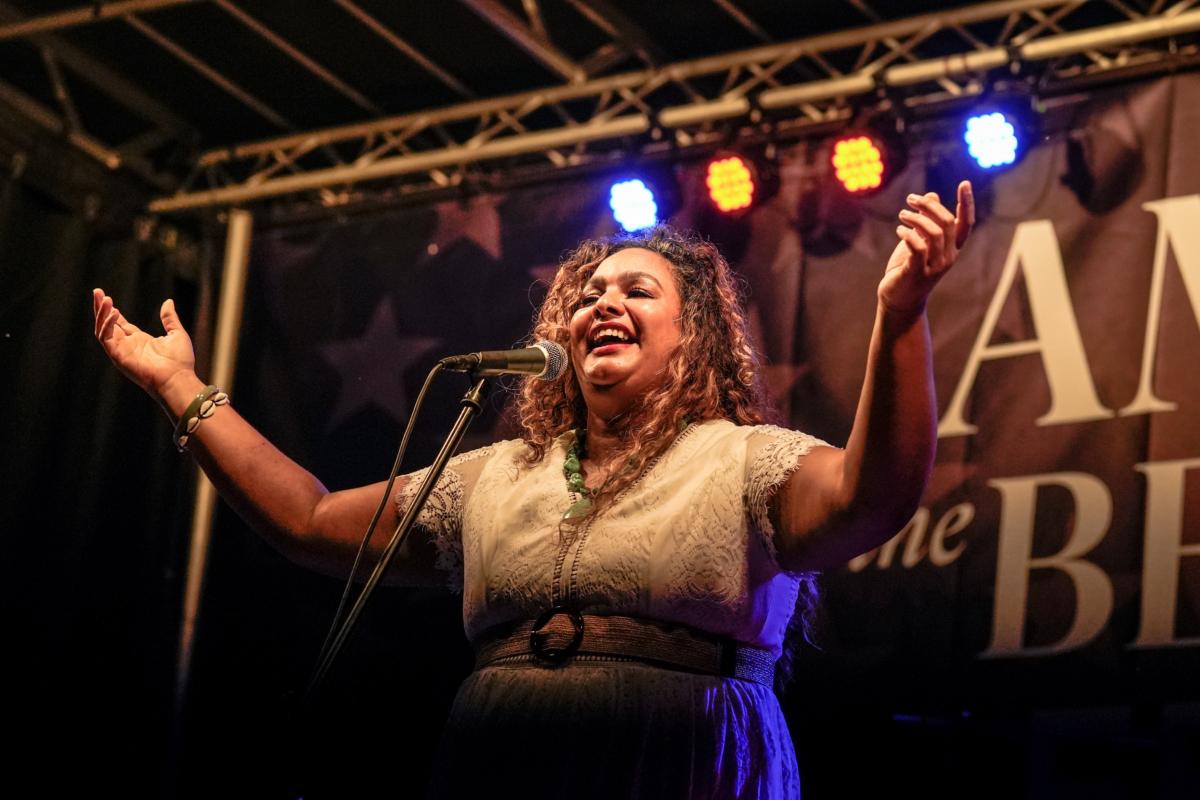 Mika Hale sings “America the Beautiful” at the America the Beautiful Festival in Deerpark, N.Y., on July 2, 2023. (Samira Bouaou/The Epoch Times)